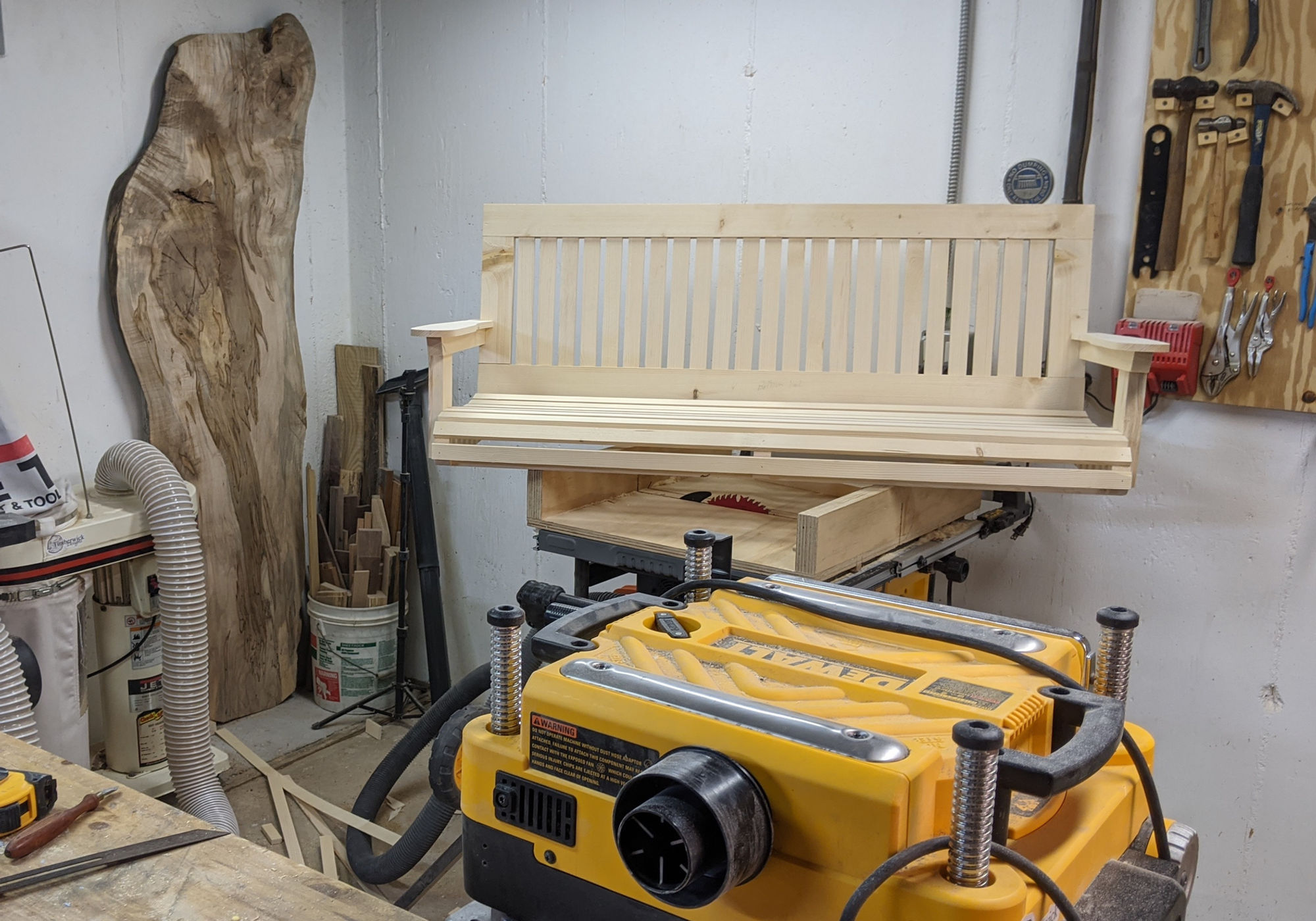 Porch swing being built in the shop